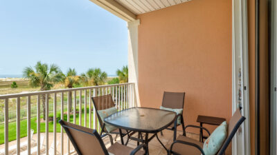 026 Grandma's Condo Outdoor Dining Space on Covered Back Balcony