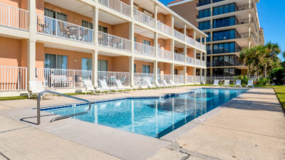 032 Grandma's Condo Shared Pool with Lounge Seating